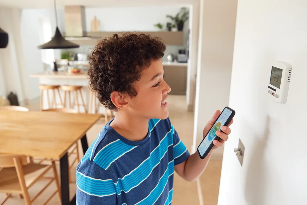 Preteen Controlling Smart Home